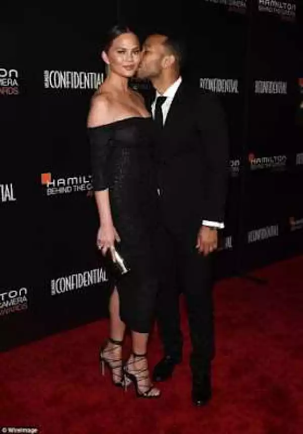 Chrissy Teigen and John Legend show some PDA on the red carpet of the Hamilton Behind The Camera Awards
